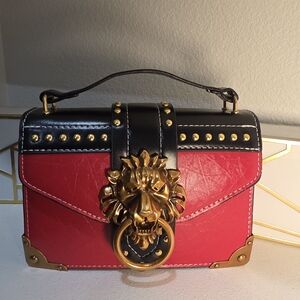Red and Black Lion-Emblem Top-Handle Women’s Bag